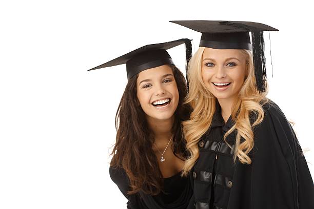 istock Happy graduates in graduation cap 186218308