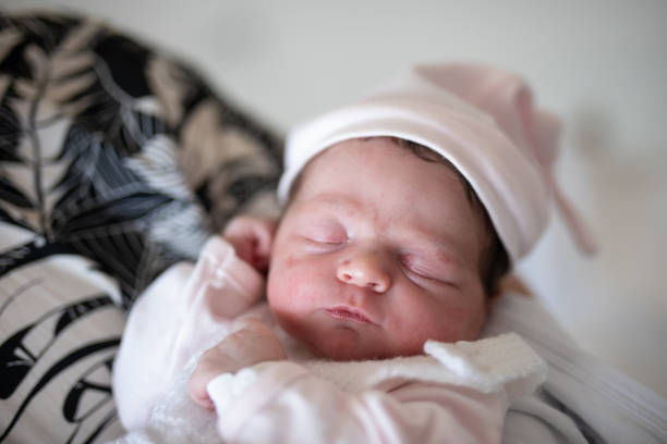 istock Father holding his newborn daughter for the first time 1862190300
