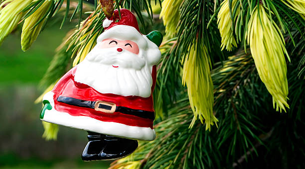 istock Santa Claus hanging on Christmas Tree 186221406