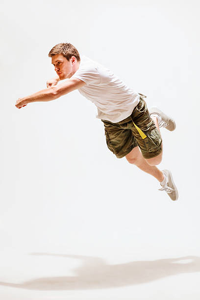 istock male dancer jumping in the air 186221612