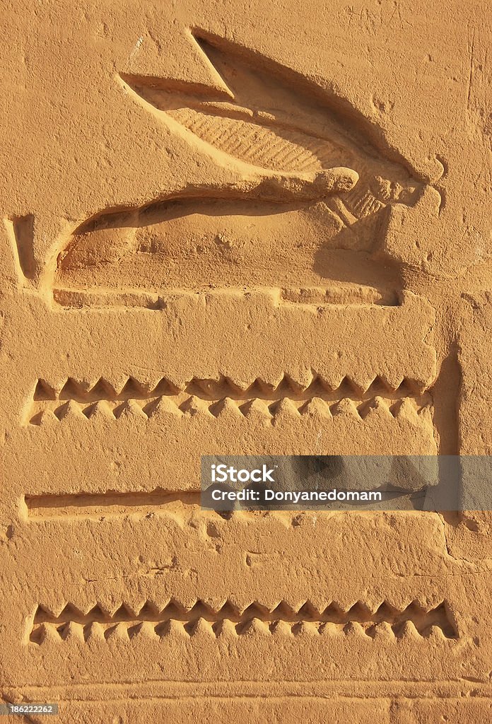 Ancient hieroglyphics on the walls of Karnak temple complex, Luxor Ancient hieroglyphics on the walls of Karnak temple complex, Luxor, Egypt Africa Stock Photo
