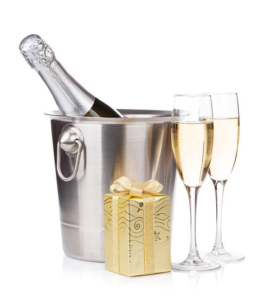 istock Champagne bottle in bucket, glasses and gift box 186223044