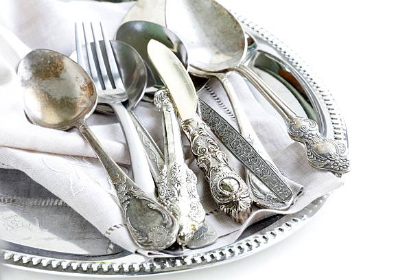 istock vintage cutlery with old-fashioned napkin on a silver tray 186224092