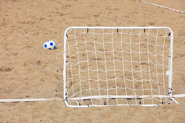 istock football gate and ball, beach soccer 186224105