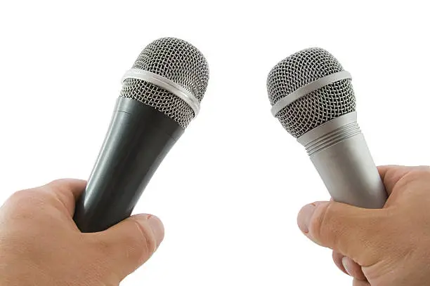 Photo of Hand with wireless microphone isolated on white background