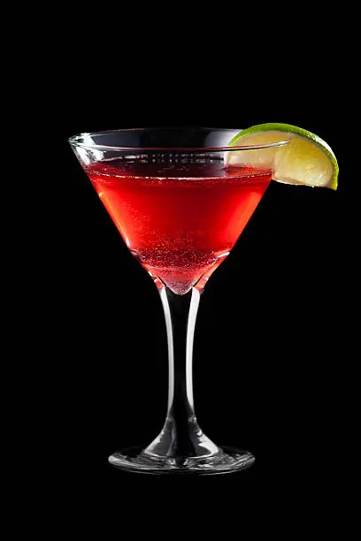 Cosmopolitan coctail isolated on black background