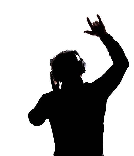 istock Man rocking on with headphones 186226767