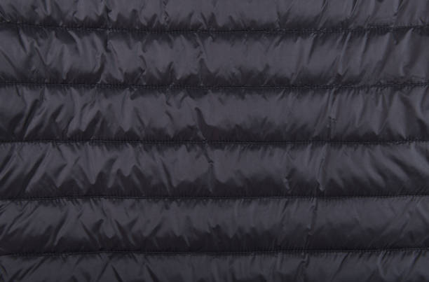 istock Black fabric of a men's winter jacket as a background, outerwear, jacket. 1862283064