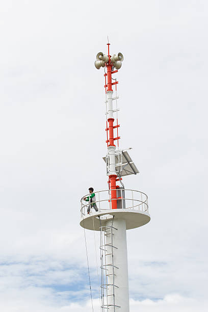 istock technician is repairing loudspeakers broadcasting and cloud background 186228835
