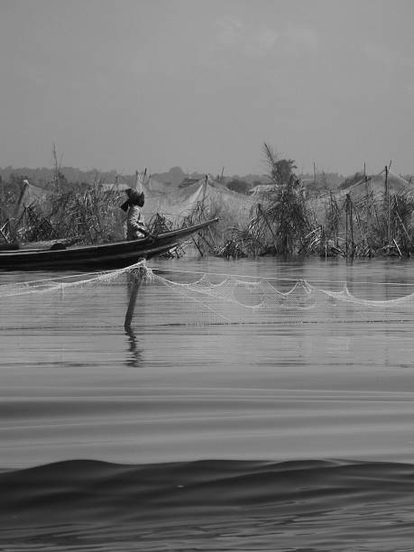 istock Woman in a canoe 186230895
