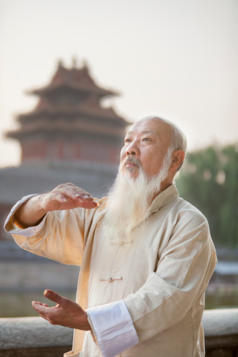 Senior Man Practicing Tai Ji