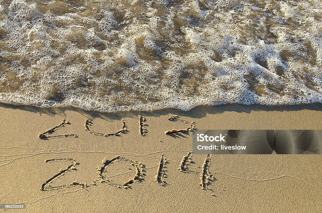 New Year 2014 beach New Year for 2014 written in beach sand. 2014 Stock Photo