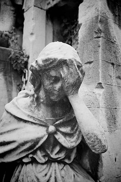 istock Angel statue in a cemetery 186232793
