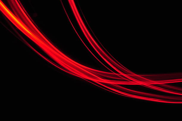 istock red orange lines trace on black background 186233055