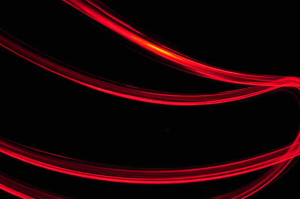 istock red orange lines trace on black background 186233067