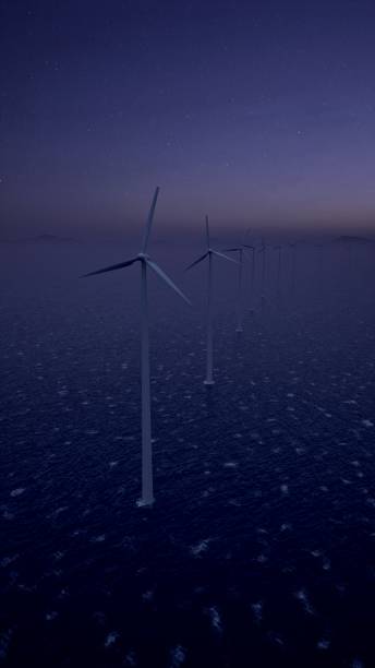 istock Wind Turbine On Water At Night 1862346788