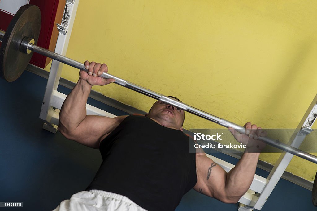 Lifting Weights Bodybuilder In Gym Exercising On The Bench Press Active Lifestyle Stock Photo