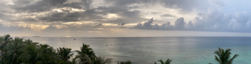 Panoramic view of a beautiful tropical sunset during the monsoon season