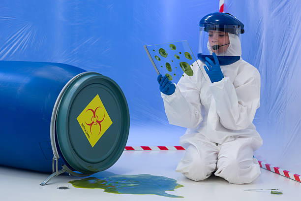 istock female biohazard specialist at work 186235908