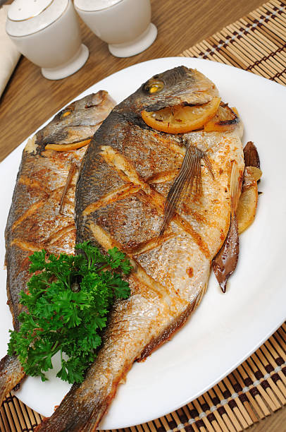 istock Baked fish with lemon Dorado 186236404