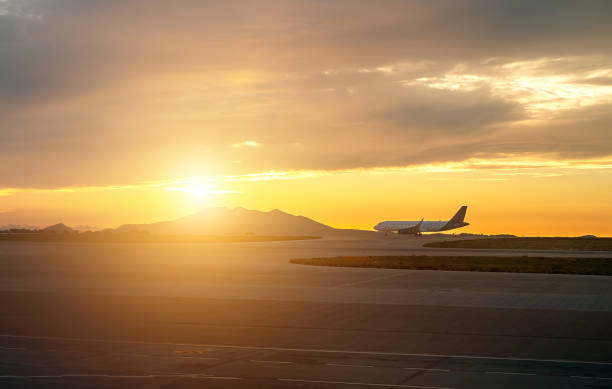istock Commercial plane prepares to take off at sunset. 1862413023