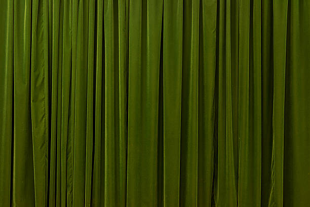 Green Curtain Nice green curtain for a background. velvet curtain stock pictures, royalty-free photos & images