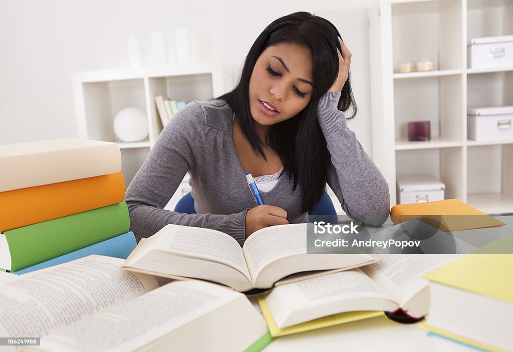 Portrait Of Young Woman Studying Portrait Of Young Happy Woman Studying At Home Adult Stock Photo