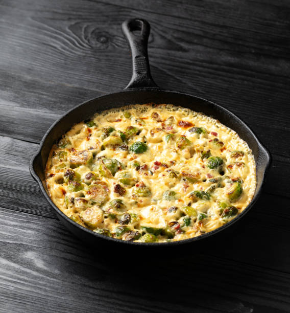 istock Creamy Garlic Parmesan Brussel Sprouts with Bacon in iron cast pan 1862441178