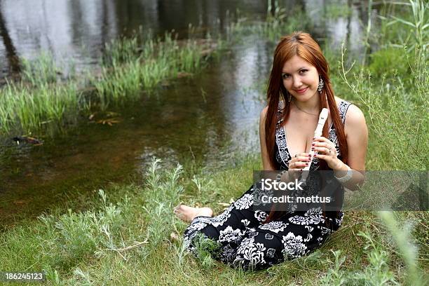 Portrait Of Beautiful Young Woman In Park Stock Photo - Download Image Now - 20-24 Years, Adult, Adults Only