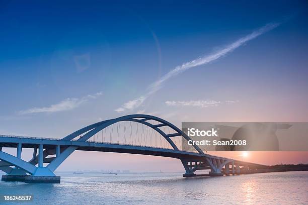 Xiamen Wuyuan Bridge And Sunrise Stock Photo - Download Image Now - Bridge - Built Structure, Arch - Architectural Feature, Sun