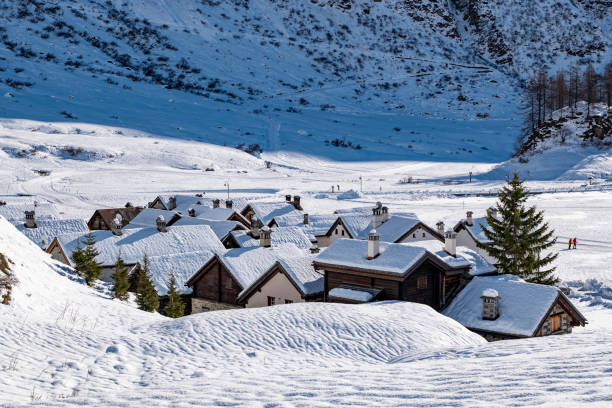 istock Snowy roofs in an alpine village 1862458775