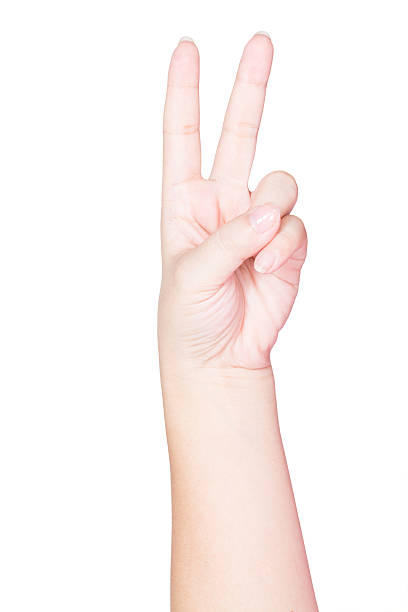 istock Female hand holding two fingers 186246022