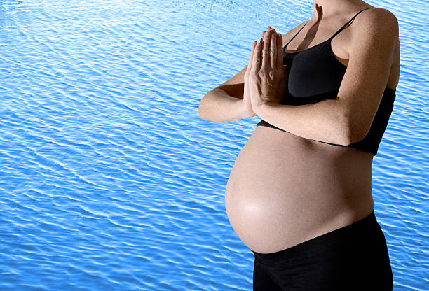 zen pregnancy meditation and pregnancy water birth stock pictures, royalty-free photos & images