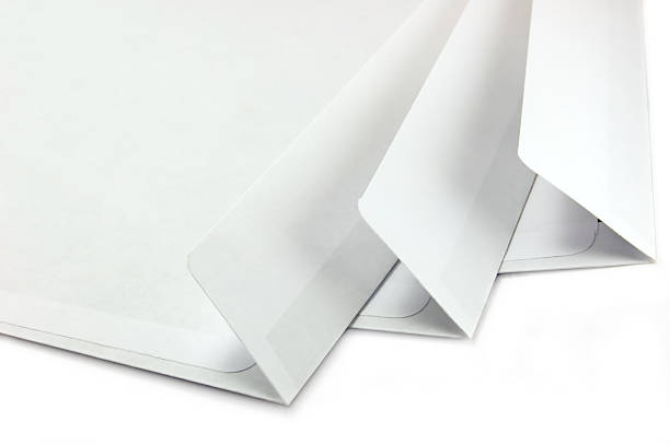 istock Three open envelopes, isolated macro closeup, detailed studio shot 186246614