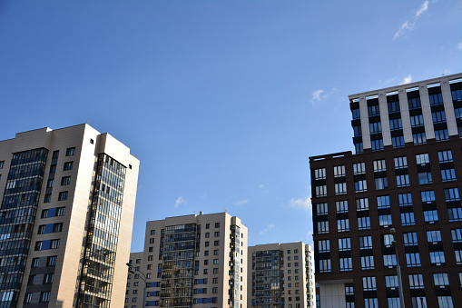 group of buildings with blue sky on background copy space