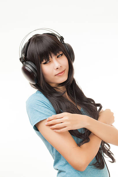 istock asian woman and headphone 186247182