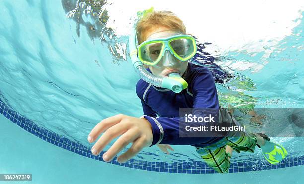 Child Swimming Stock Photo - Download Image Now - Child, Swimming Pool, Wetsuit