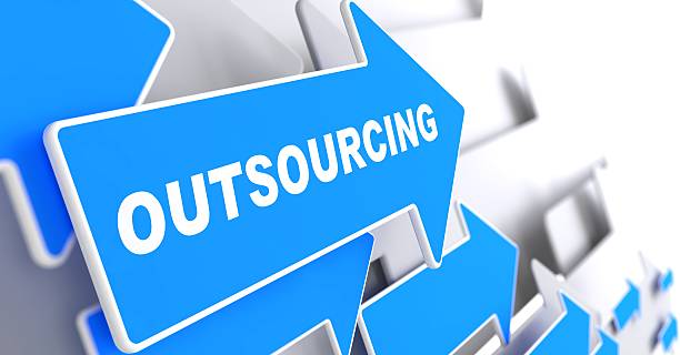 istock Blue and white arrows that say outsourcing 186247518