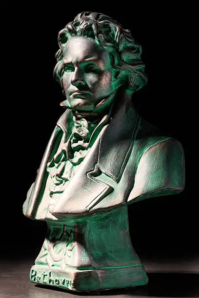 beethoven sculpture on black background