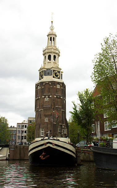 amsterdam-montelbaanstoren clock tower - munt tower zdjęcia i obrazy z banku zdjęć