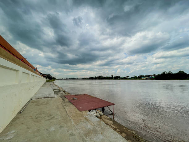 Old jetty on Chao Phraya riverbank, Bangkok, Thailand