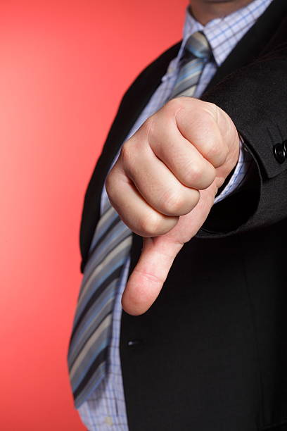 istock Business man showing thumb down 186249475