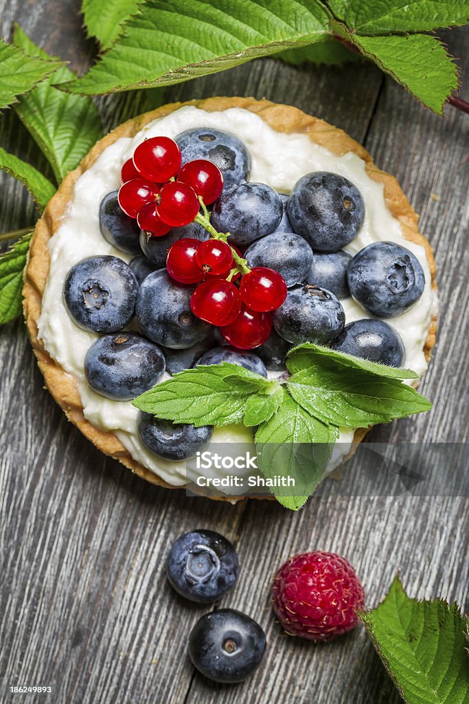 Small cupcake with berry fruits Small cupcake with berry fruits. Abundance Stock Photo