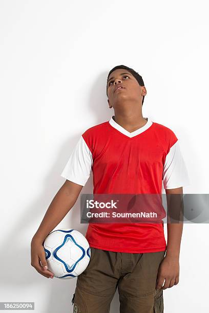 Football Player Soccer Player Holding A Football Stock Photo - Download Image Now - Cut Out, Sport, White Background