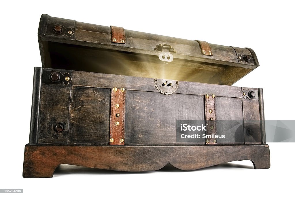 Treasure chest reveals a luminous secret Vintage treasure chest opens to reveal a luminous but hidden secret Treasure Chest Stock Photo