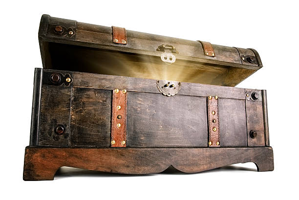 Treasure chest reveals a luminous secret Vintage treasure chest opens to reveal a luminous but hidden secret trunk furniture photos stock pictures, royalty-free photos & images