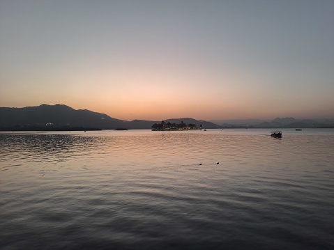 Sunset boat ride in Lake Pichola in Udaipur, Rajasthan, India
