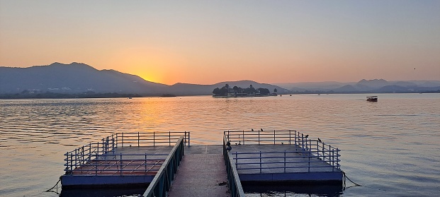 Beautiful sunset over the hills behind Lake Pichola in Udaipur, Rajasthan, India