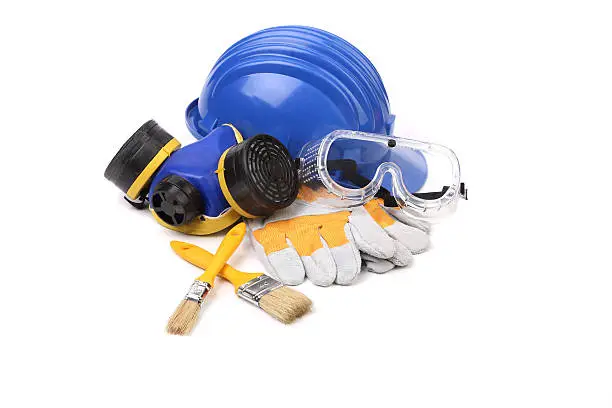 Blue safety helmet with respirator and goggles. Isolated on white background.