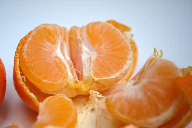 istock peeled tangerine slices in a glass 1862539092